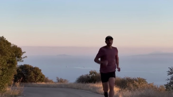 a man running on a road